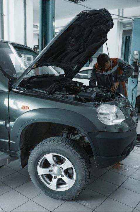 Technician working on a van